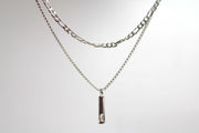 Baguette Bar layered Cuban chain necklace.
