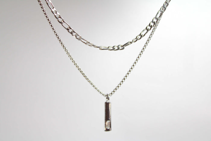 Baguette Bar layered Cuban chain necklace.