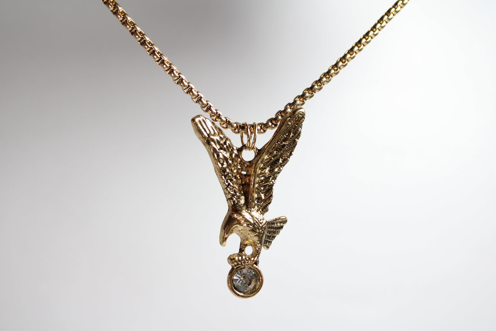 Gold eagle necklace